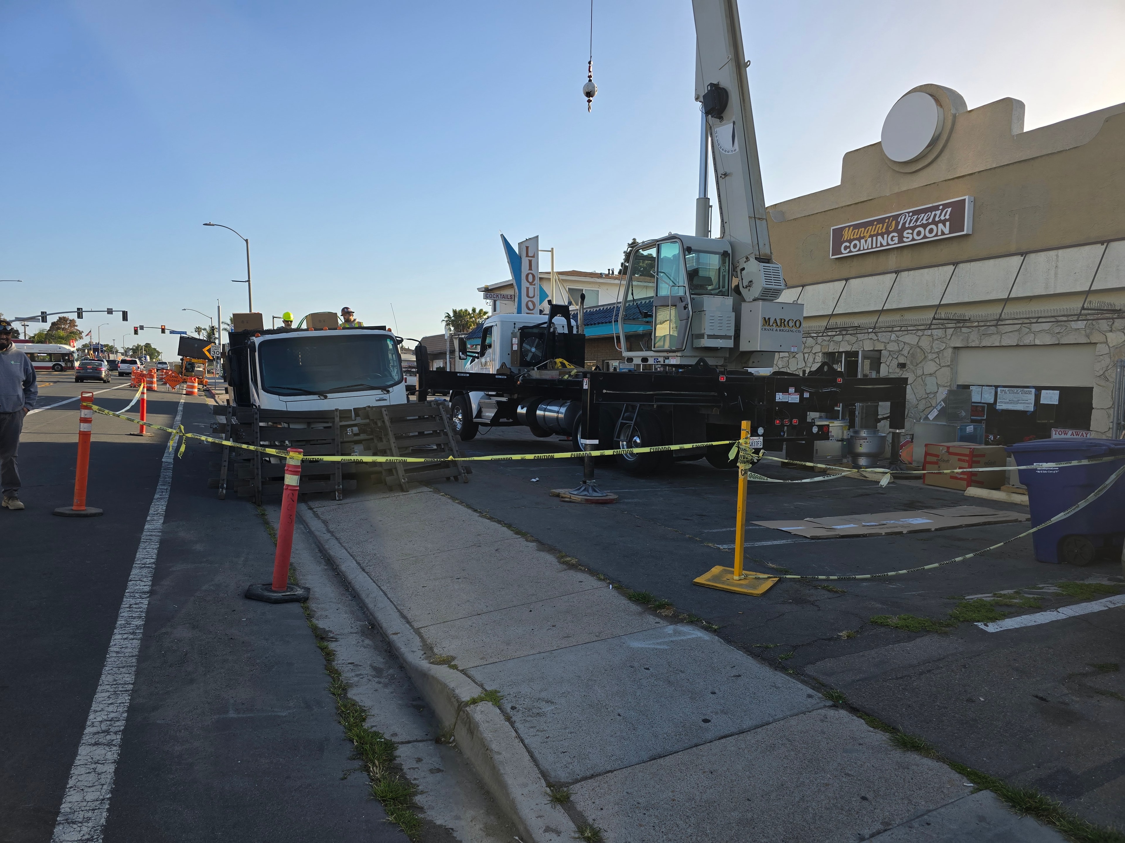 C.R. Smith Construction crane operation at a San Diego commercial project site